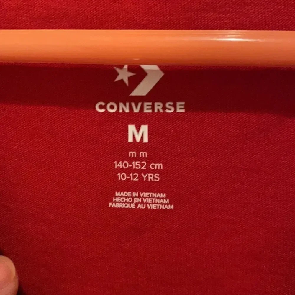 Never worn converse tee M